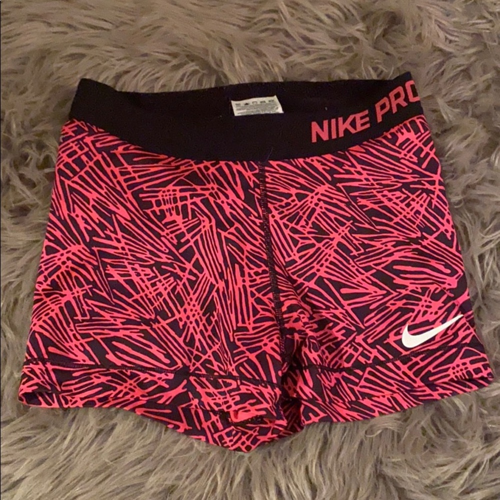 Pink Nike pros